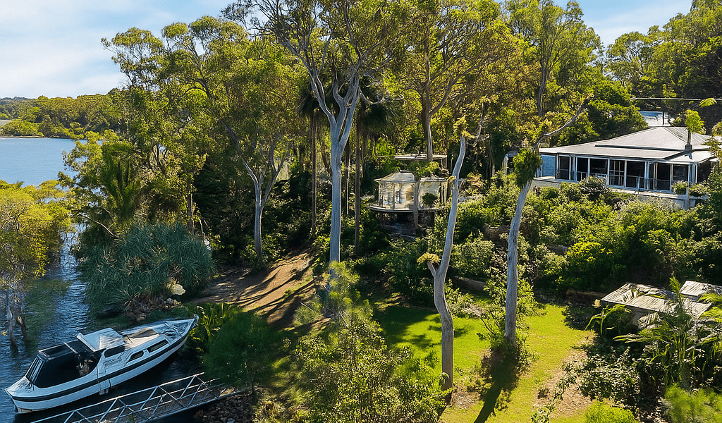 Waterfront Retreat with Docked Boat